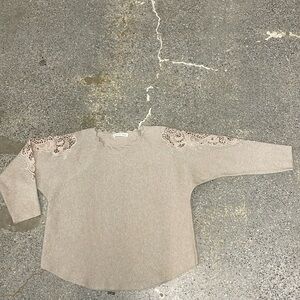Dolman sweater with lace trim